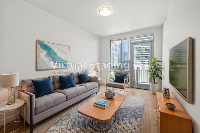 living room with light hardwood / wood-style flooring