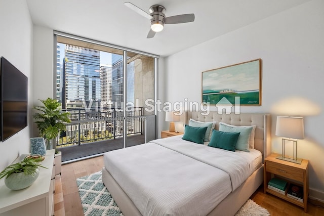 bedroom with light wood-type flooring, access to outside, and ceiling fan