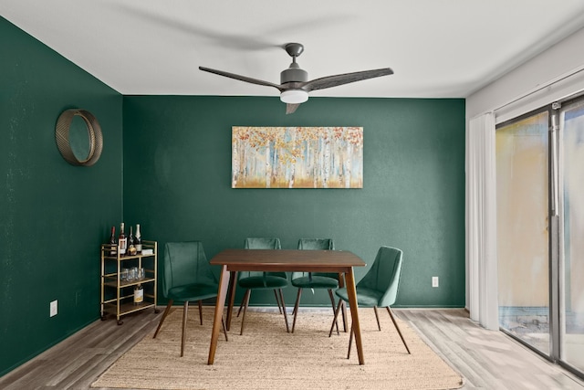 office with ceiling fan and hardwood / wood-style floors