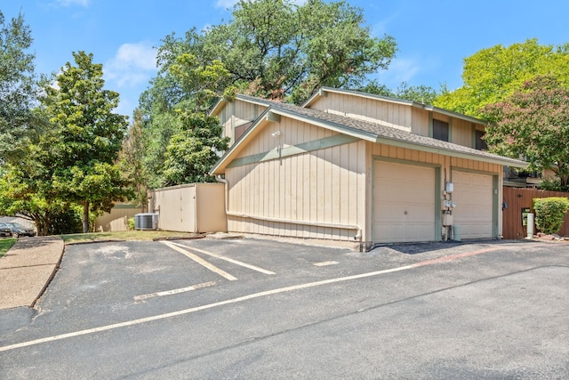 garage featuring central air condition unit