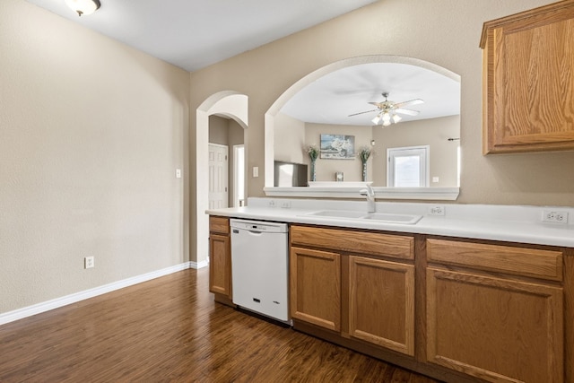 kitchen featuring dishwasher, sink, ceiling fan, and dark hardwood / wood-style floors