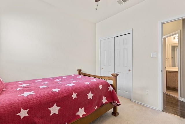 bedroom featuring a closet and carpet floors