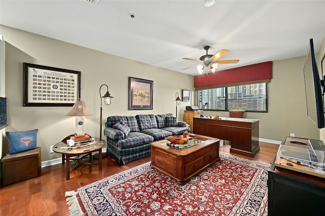 40 N Interstate Highway 35 Unit 8C1, Austin, TX 78701 - living room with wood finished floors and a ceiling fan