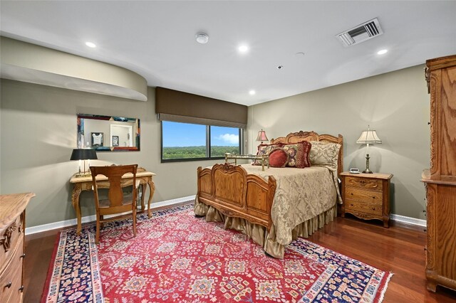 40 N Interstate Highway 35 Unit 8C1, Austin, TX 78701 - bedroom featuring wood finished floors and recessed lighting