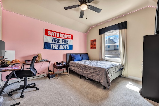 bedroom featuring ceiling fan, light colored carpet, and vaulted ceiling