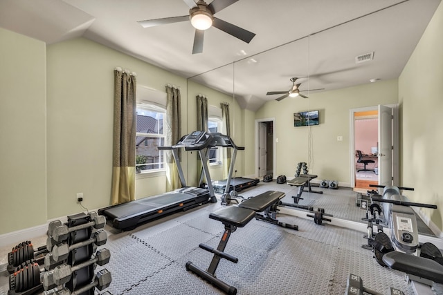 workout room featuring lofted ceiling and ceiling fan