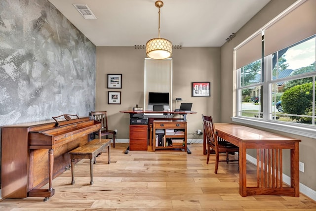 office space featuring light wood-type flooring