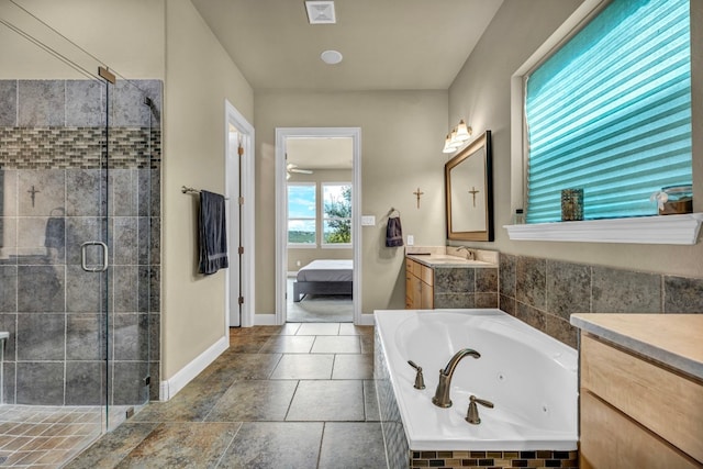 4309 Vista Verde Dr, Austin, TX 78732 - ensuite bathroom with visible vents, vanity, a whirlpool tub, a shower stall, and ensuite bath