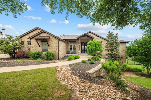 craftsman-style home featuring a front yard