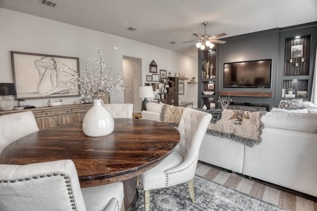 dining area with ceiling fan