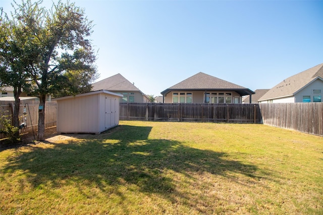 view of yard with a storage unit