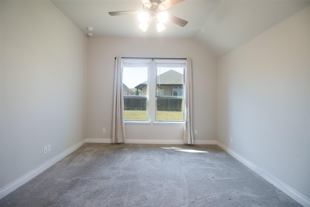 spare room with ceiling fan and carpet flooring