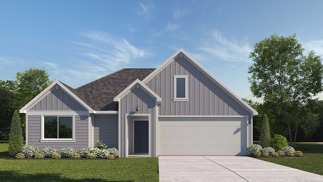 view of front facade with a garage and a front yard