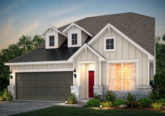 view of front of home with a garage