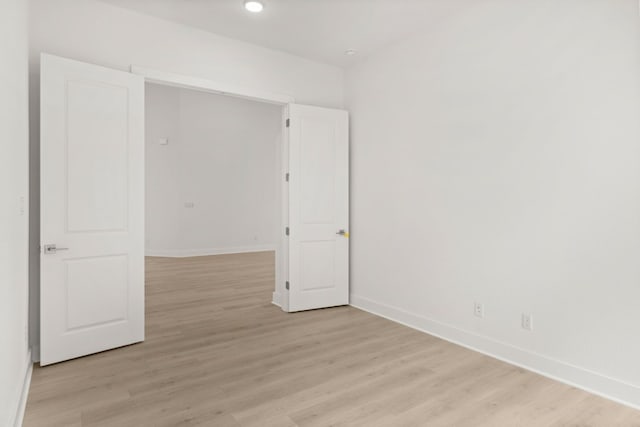 204 Camille St, Leander, TX 78641 - unfurnished room with light wood-style floors, baseboards, and recessed lighting