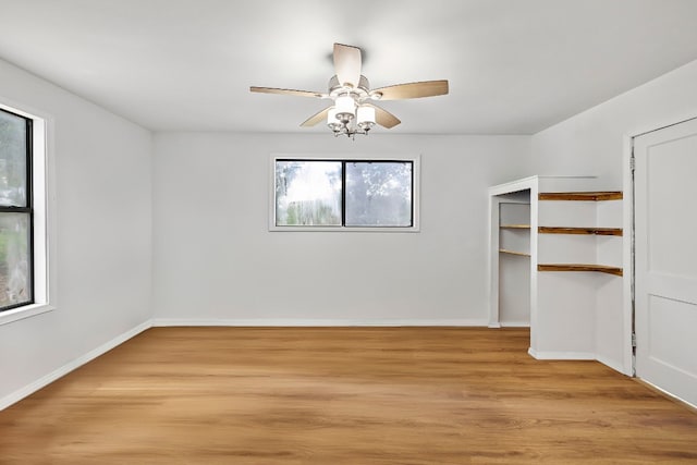 unfurnished room featuring ceiling fan and light hardwood / wood-style floors