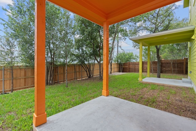 view of yard with a patio area and a fenced backyard