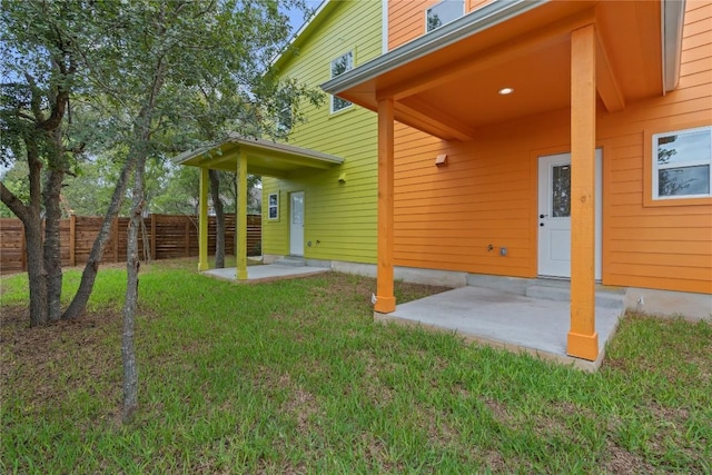 view of yard featuring a patio area and a fenced backyard