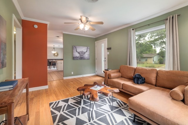 1511 Fairfield Dr, Austin, TX 78757 - living room featuring a ceiling fan, light wood-type flooring, crown molding, and baseboards