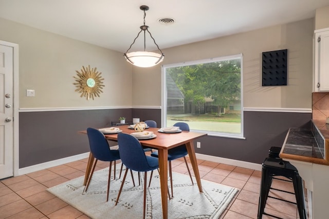 1511 Fairfield Dr, Austin, TX 78757 - dining area with light tile patterned flooring and baseboards
