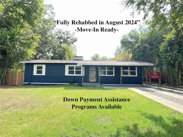 single story home featuring a front yard and covered porch