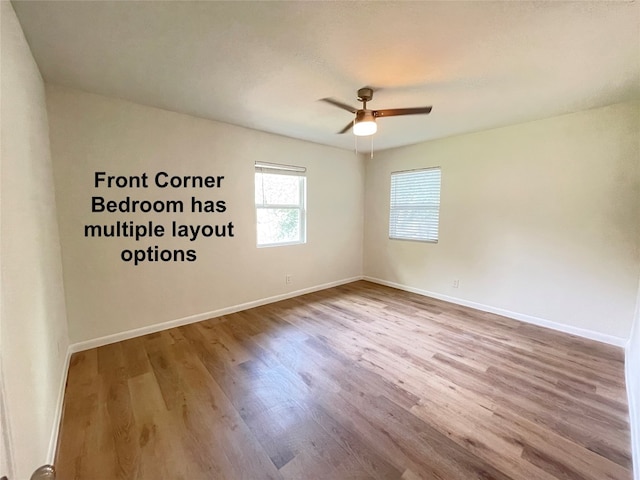 spare room featuring ceiling fan and light hardwood / wood-style floors