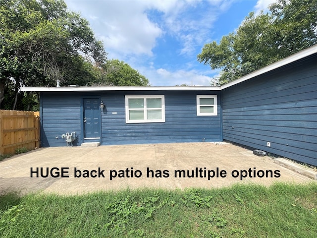 rear view of house with a patio