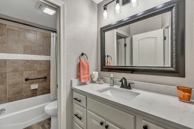 full bathroom with shower / bath combo with shower curtain, wood-type flooring, toilet, and vanity