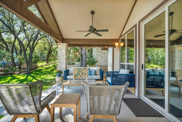 view of patio featuring an outdoor living space and ceiling fan