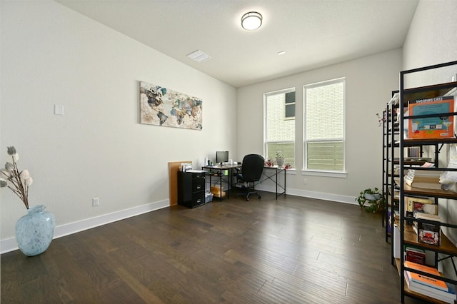 office space with dark hardwood / wood-style floors