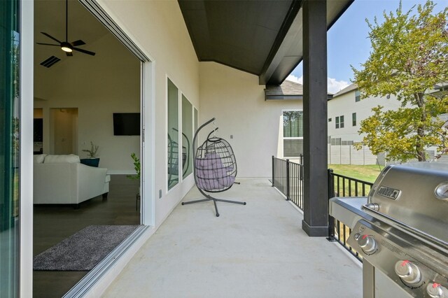 balcony featuring ceiling fan