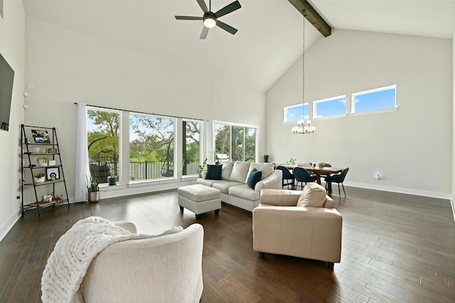 living area featuring beamed ceiling, baseboards, dark wood finished floors, and ceiling fan with notable chandelier