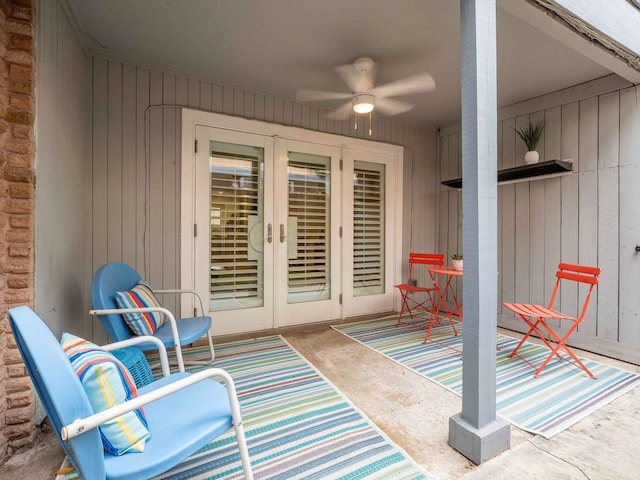 view of patio featuring ceiling fan and french doors