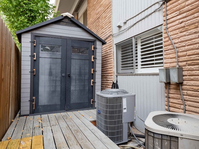 wooden deck featuring central AC