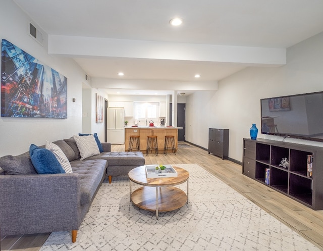 living room featuring light hardwood / wood-style floors