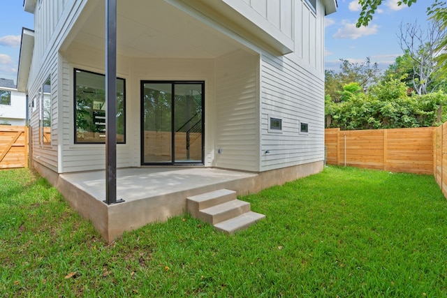 5511 William Holland Ave Unit 2, Austin, TX 78756 - back of house featuring board and batten siding and a fenced backyard