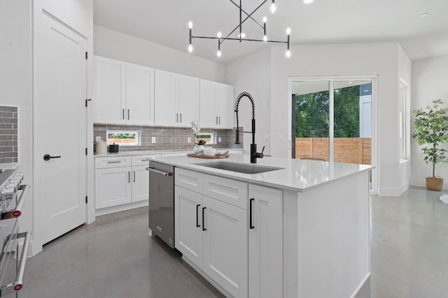 5511 William Holland Ave Unit 2, Austin, TX 78756 - kitchen with stainless steel dishwasher, concrete flooring, tasteful backsplash, and white cabinetry