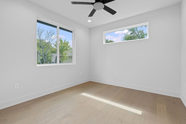 5511 William Holland Ave Unit 2, Austin, TX 78756 - empty room featuring plenty of natural light, light wood finished floors, ceiling fan, and recessed lighting