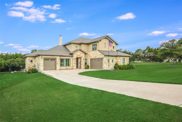 view of front facade with driveway, a garage, stone siding, a chimney, and a front yard