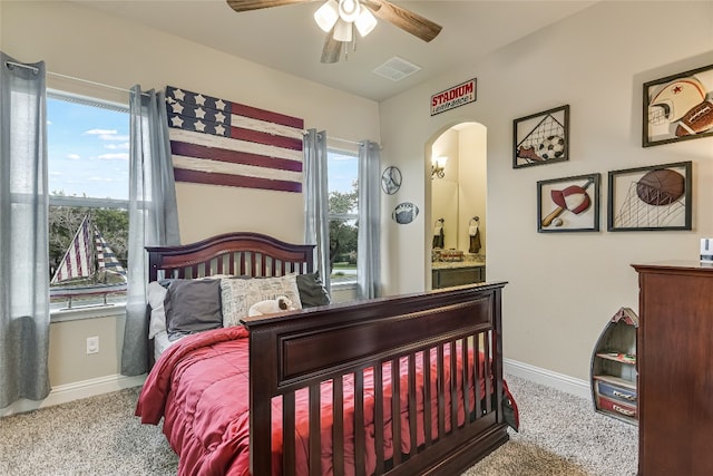 carpeted bedroom featuring ceiling fan