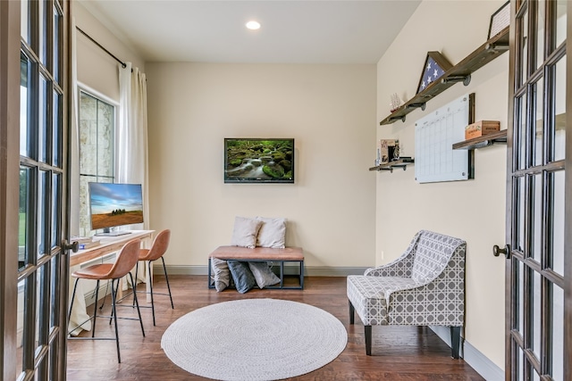 sitting room with french doors and dark hardwood / wood-style flooring