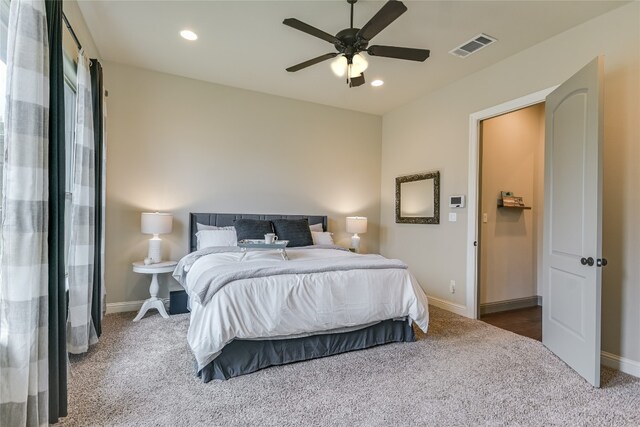 bedroom featuring carpet and recessed lighting