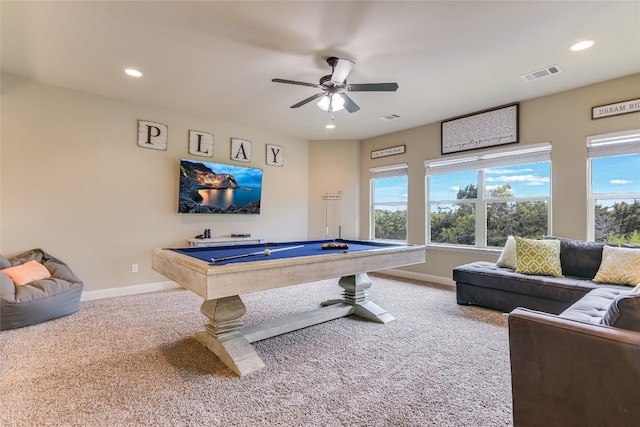 playroom featuring carpet, a healthy amount of sunlight, visible vents, and baseboards