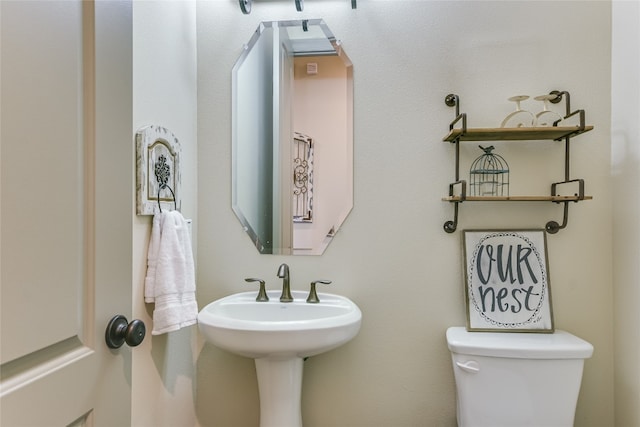 bathroom featuring toilet