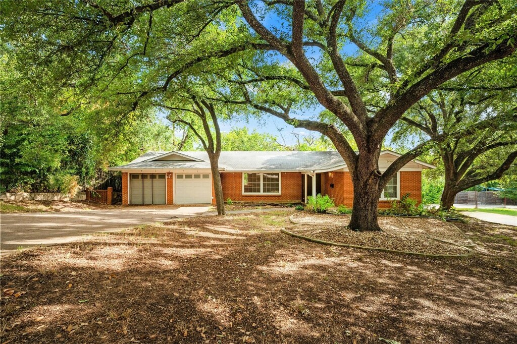 ranch-style home with a garage