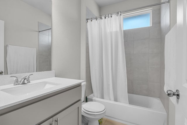 full bathroom with vanity, toilet, and shower / tub combo with curtain