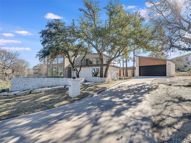 view of front of property with a garage