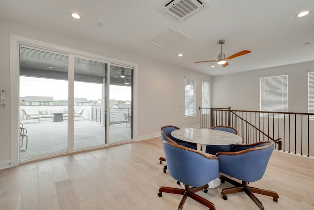 4209 Elevator Dr, Austin, TX 78731 - dining area featuring wood finished floors, recessed lighting, attic access, and baseboards