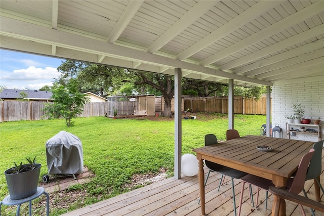 deck featuring a lawn