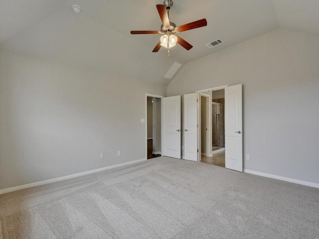 unfurnished bedroom featuring carpet flooring, ceiling fan, and lofted ceiling